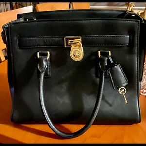 Michael Kors Hamilton Traveler Black Leather Handbag with Gold Hardware